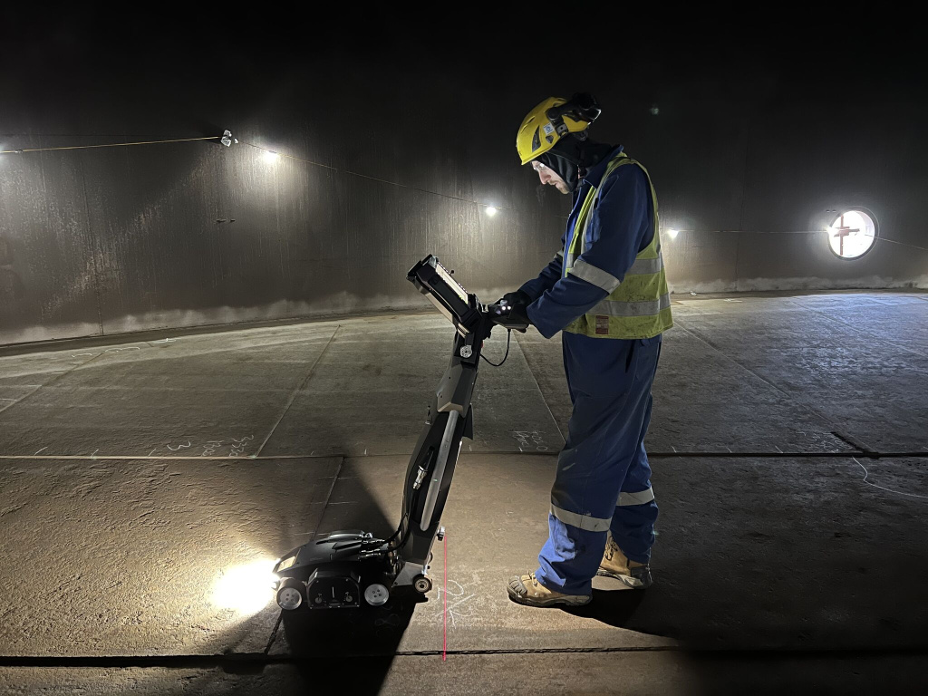 FMX inside tank with operator Photo Credit to C&D Access.jpeg